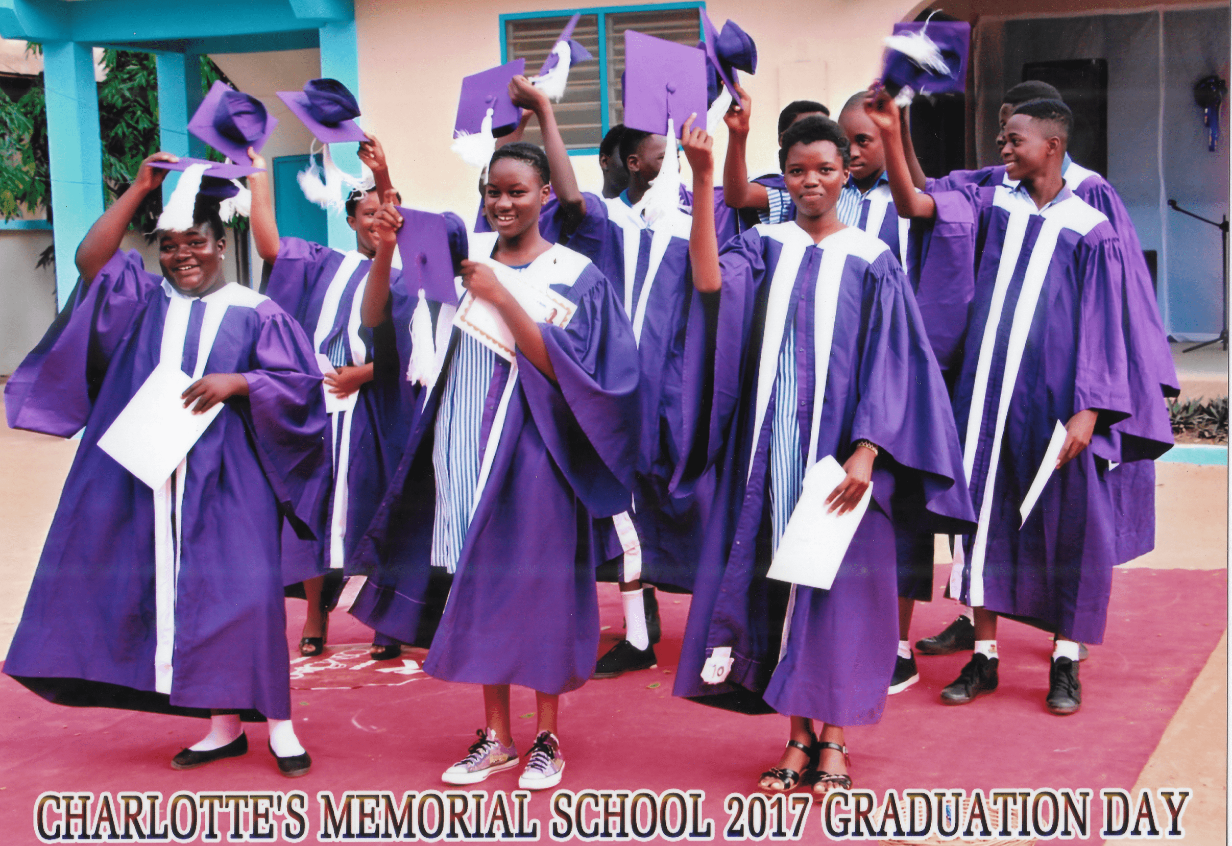 Students taking photos at graduation